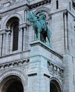 sculpture near a building in paris