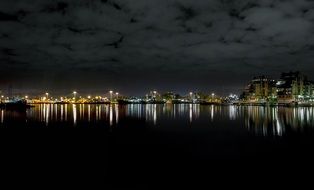 night city building Reflection on river surface