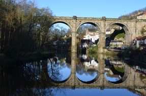 landscape of Old bridge with the railways on it and lake