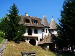 beautiful thatched houses on a hill