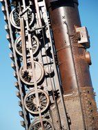 monument to the steam engine against the blue sky