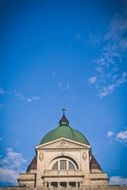 green dome of church at blue sky