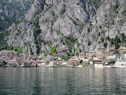 distant view of the city on the rocky coast of Lake Garda