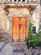 wooden entrance door to an old house in mexico