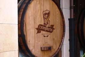 cider in a wooden barrel