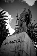 black and white photo of the bottom view of the Greek statue