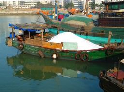 boat with the goods at the harbor in Haikou, China