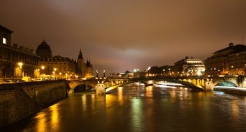 night Paris, bridge over the river Seine