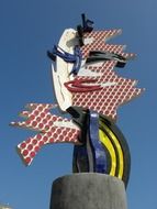 sculpture against the blue sky in Barcelona