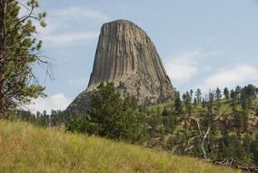 landscape of diabolical tower amidst nature in wyoming