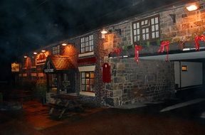 stone public house in night illumination