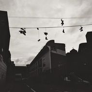 shoes over city street