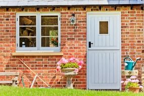 door and window in a brick cottage