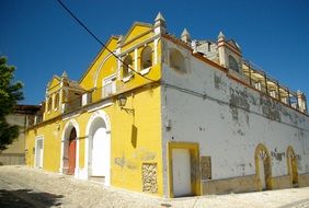 old yellow building in Alhama de Granada, Spain