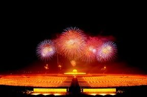 fireworks over dhammakaya pagoda at night