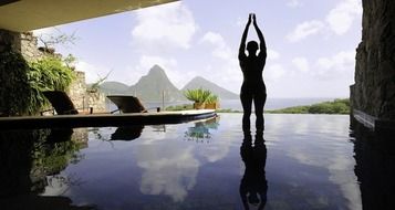 silhouette of a person in the pool