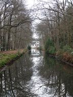 distant view of a castle in a picturesque park in the netherlands