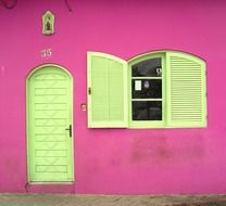 house with a pink wall