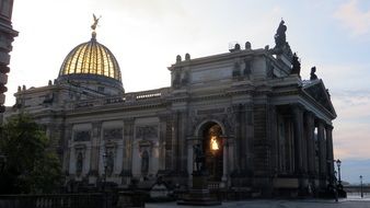 building with a dome in dresden at dusk