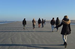 People group on sand beach