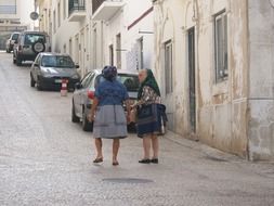 two elderly women outdoors in Portugal