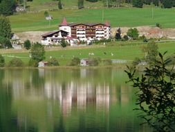 hotel near lake, alpine landscape, Austria, tannheim