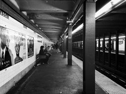 Black and white photo of subway station