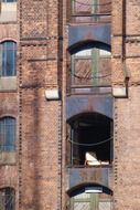 old brick wall with balconies, germany, hamburg, speicherstadt