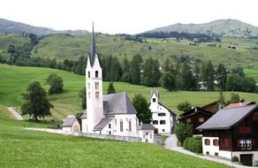 white church near the mountains