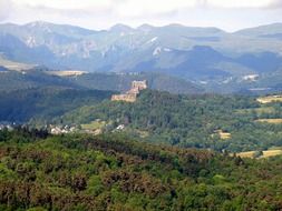 scenic landscape with castle, cloudy sky, france