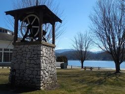 bell in a small tower on the shore of lake Junaluska