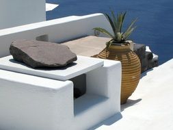 photo of the chimney on the roof in Greece