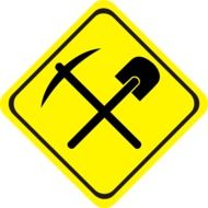 yellow road sign about construction work