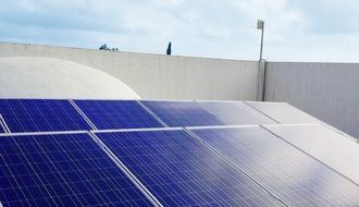 solar power electricity generator at house roof