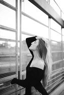 Black and white picture of a posing woman