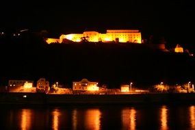 landscape of bright house of lords in a dark