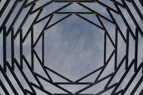 Metal art work of symmetry sky scene