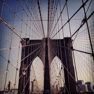 ropes of suspension bridge at dusk, usa, brooklyn, nyc