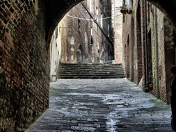 archway in the old city in Italy