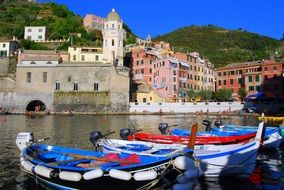 blue boats on the water