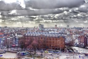 historical center under scenic clouds, netherlands, Amsterdam