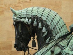 closeup picture of bronze monument of a horse