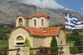greek flag near church