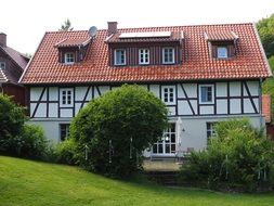 Half-timbered house with white walls