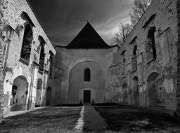 black and white picture of a old shabby church