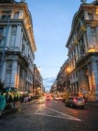 via nazionale, historical street with cobblestone pavement at evening, italy, rome