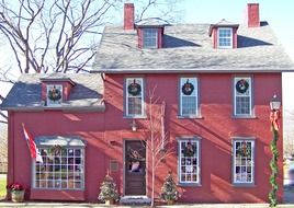 Picture of the red House in a village