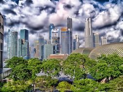 city skyscrapers against cloudy sky, singapore