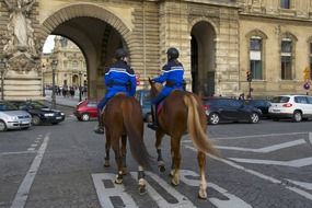 Mounted police on a city street in Paris