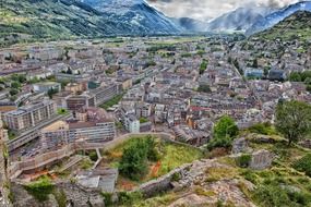 top view of scenic city in mountain valley, switzerland, sion